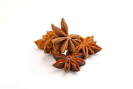 Star anise spice fruits and seeds isolated on white background closeup.の写真素材