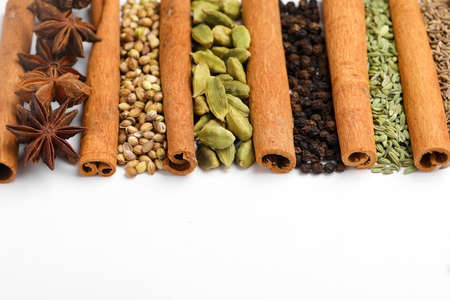 Indian spices and herbs on white background.の写真素材