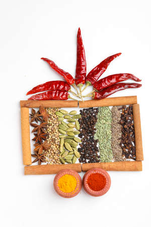 Indian spices and herbs on white background.の写真素材