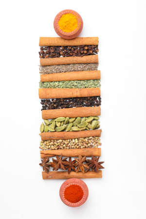 Indian spices and herbs on white background.の写真素材
