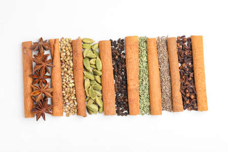 Indian spices and herbs on white background.の写真素材