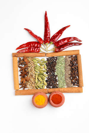 Indian spices and herbs on white background.の写真素材