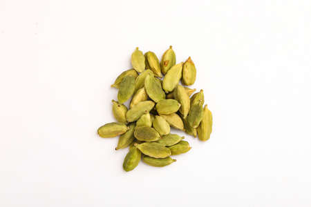 Fresh dried green cardamom seeds spice on white background ,の写真素材