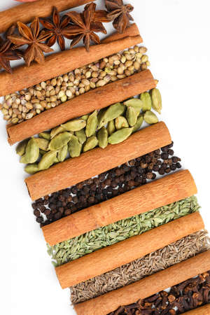 Indian spices and herbs on white background.の写真素材