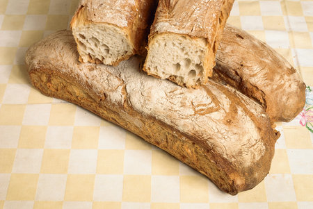 Loaves of bread on a linen tablecloth