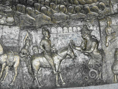 Metal art carved Buddha in Watthammongkon temple Thailand の写真素材