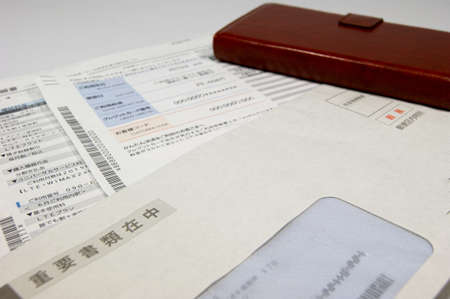 Cell phone invoice documents and mobile phonesの写真素材