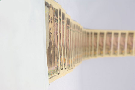 Away from the envelope a lot of 10000 Yen bills