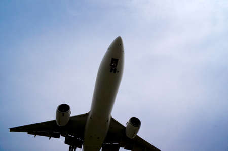 Jet passenger plane to land at Osaka International Airportの写真素材