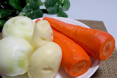 Three kinds of classic vegetables for the curry by motherの写真素材