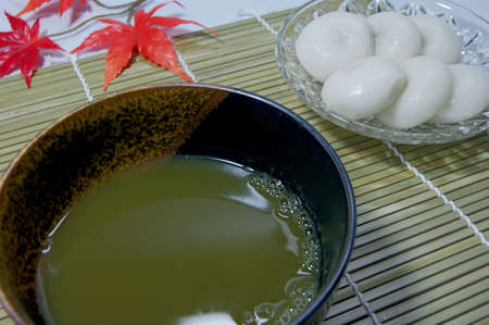 Mitarashi dumplings and green tea in Japanの写真素材