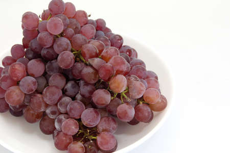 This sweet Delaware grapes is cultivated in Japan.の写真素材