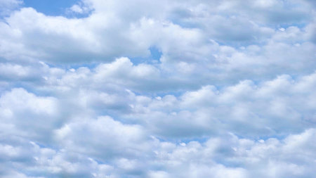 blue sky background with tiny clouds, nature cloud background, blue sky with tiny cloudsの写真素材