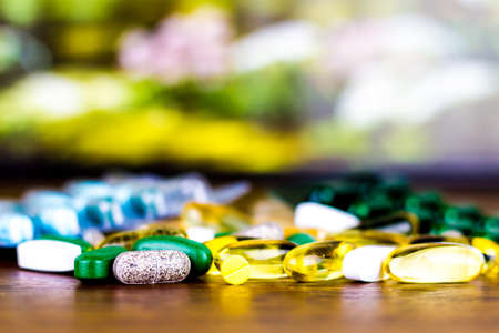 Drug prescription for treatment medication. Pharmaceutical medicament, cure in container for health. Pharmacy theme, capsule pills with medicine antibiotic in packages.の写真素材