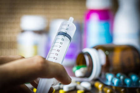 Drug prescription for treatment medication. Pharmaceutical medicament, cure in container for health. Pharmacy theme, capsule pills with medicine antibiotic in packages.のeditorial素材