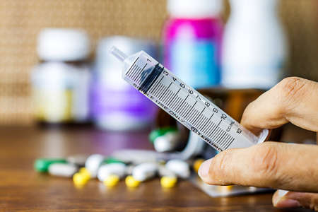 Drug prescription for treatment medication. Pharmaceutical medicament, cure in container for health. Pharmacy theme, capsule pills with medicine antibiotic in packages.のeditorial素材