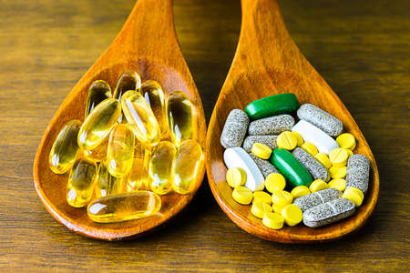 Drug prescription for treatment medication. Pharmaceutical medicament, cure in container for health. Pharmacy theme, capsule pills with medicine antibiotic in packages.の写真素材