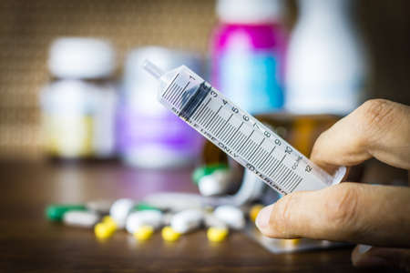 Drug prescription for treatment medication. Pharmaceutical medicament, cure in container for health. Pharmacy theme, capsule pills with medicine antibiotic in packages.のeditorial素材