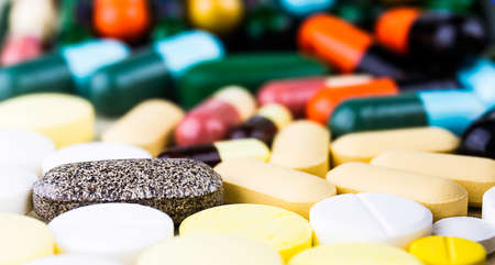Drug prescription for treatment medication. Pharmaceutical medicament, cure in container for health. Pharmacy theme, capsule pills with medicine antibiotic in packages.closeup,Medicine or capsules.の写真素材