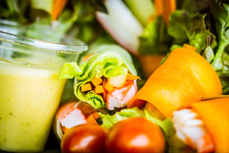 Close up of fresh salad of lettuce, cucumber and tomato on plate for healthy eating.
Fresh vegetable salad in Black plate  on wood table. Salad for healthy. Fresh raw vegetables salad background.の写真素材
