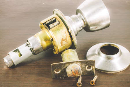 Door Knobs on wood Backgroundの写真素材