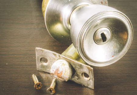 Door Knobs on wood Backgroundの写真素材