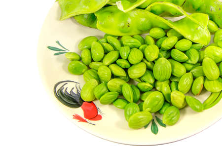 Thai cuisine Bitter Beans isolated on white background, asian eating food, Thai food, close upの写真素材
