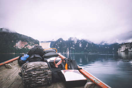 Landscape with boat and mountainsの写真素材