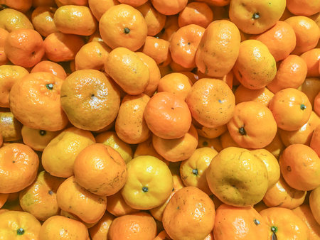 Colorful background Of Oranges In Fruit Market,Fresh mandarin oranges texture in a box