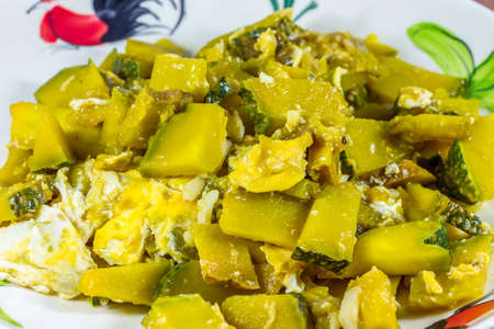 Stir-fried pumpkin with eggの写真素材