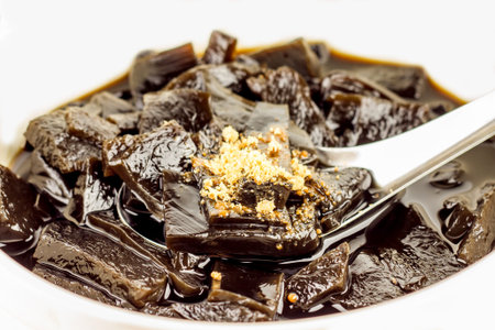 Grass Jelly isolated on white background,vegetable jelly,thailand food,Black Jellyの写真素材