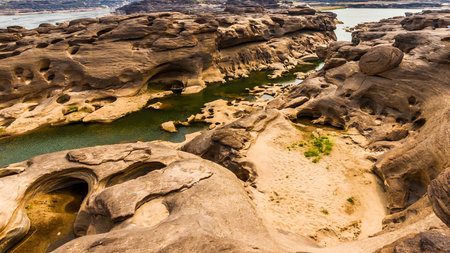 Unseen Thailand landscape view of Rock holes Stone in Sam-Pan-Bok Grand Canyon or the mekong river...