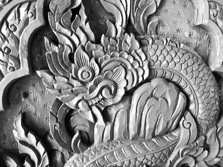Pattern art processing of sculpture image carvings on wood background. Thai style carved wooden door detail, Close up,black and whiteの写真素材
