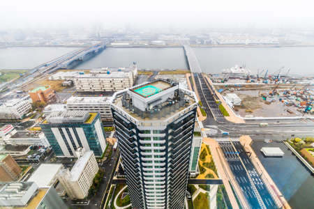 TOKYO,JAPAN,10th APRIL 2017.Top view Construction industry worker commercial and residential section weather raining and fog and building in control area in developed at downtown of tokyo,japan.のeditorial素材