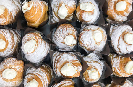 Freshly baked bread from whole wheat and grains in a supermarket.の写真素材