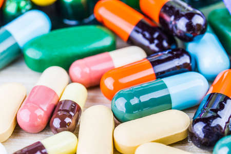 Drug prescription for treatment medication. Pharmaceutical medicament, cure in container for health. Pharmacy theme, capsule pills with medicine antibiotic in packages.closeup,Medicine or capsules.の写真素材