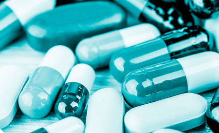 Drug prescription for treatment medication. Pharmaceutical medicament, cure in container for health. Pharmacy theme, capsule pills with medicine antibioticの写真素材