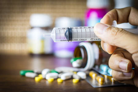 Drug prescription for treatment medication. Pharmaceutical medicament, cure in container for health. Pharmacy theme, capsule pills with medicine antibiotic in packages.の写真素材