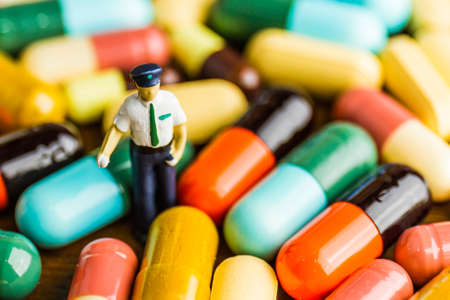 Drug prescription for treatment medication. Pharmaceutical medicament, cure in container for health. Pharmacy theme, capsule pills with medicine antibiotic in packages.closeup,Medicine or capsules.の写真素材
