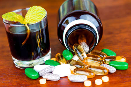 Drug prescription for treatment medication. Pharmaceutical medicament, cure in container for health. Pharmacy theme, capsule pills with medicine antibiotic in packages.の写真素材