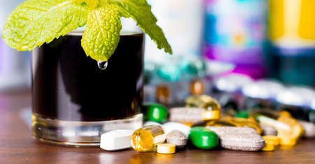 Drug prescription for treatment medication. Pharmaceutical medicament, cure in container for health. Pharmacy theme, capsule pills with medicine antibiotic in packages.の写真素材