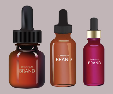 Set of realistic glass dropper bottles with essential oils. Vector illustrationのイラスト素材
