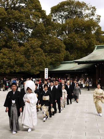 HARAJUKU,TOKYO - MARCH 25, 2012: Celebration of a typical wedding ceremony in Meiji Jingu Shrine Harajuku Tokyo, Japan.のeditorial素材