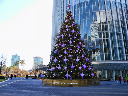 Christmas pine tree near Lotte World Tower. Seoul city, South Korea. Desember 2017のeditorial素材