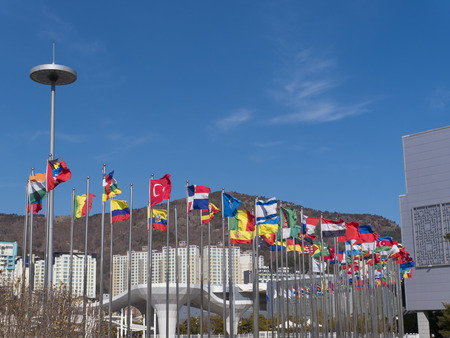 Flags of the world of flagpoles. Expo, Yeosu city. South Korea, January 2018のeditorial素材