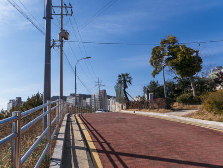 Beautiful street with red asfalt in Yeosu city. South Koreaのeditorial素材