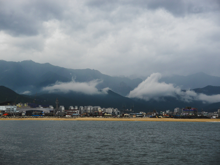 the view to sea coast in Sokcho city from the sea, South Koreaのeditorial素材