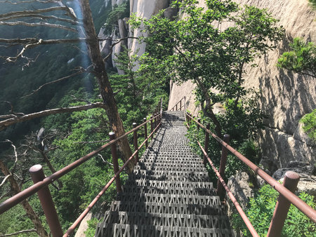 The bridge with steps leading down from the mountain peak. Seoraksan National Park. South Korea