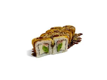 Uramaki roll california isolated on white background. Japanese sushi roll with salmon, shrimp, sesame, california cheese and sauceの写真素材