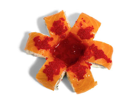 Uramaki roll california isolated on white background. Japanese sushi roll with salmon and red caviarの写真素材